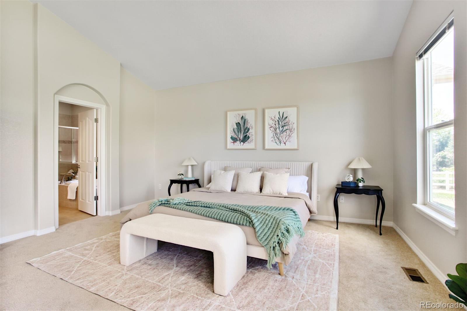 16283 Olive Way Brighton, CO 80602 - Photo 19 of 33 a bedroom with a bed and window