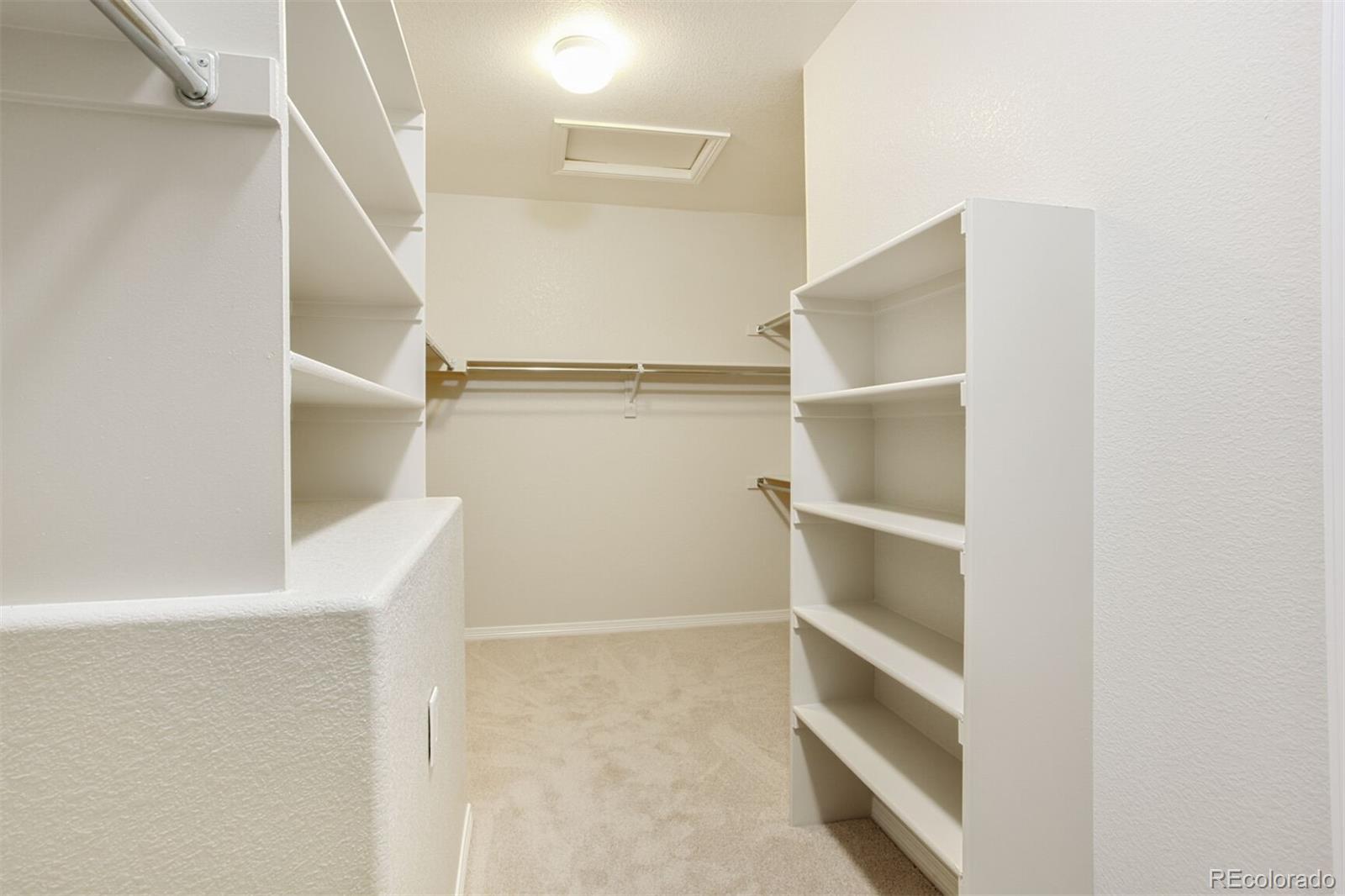 16283 Olive Way Brighton, CO 80602 - Photo 20 of 33 a view of an empty walk in closet