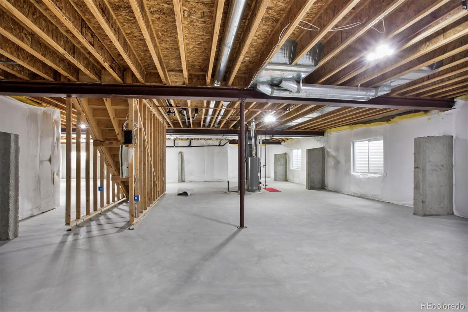 16283 Olive Way Brighton, CO 80602 - Photo 29 of 33 a view of an empty room with stairs