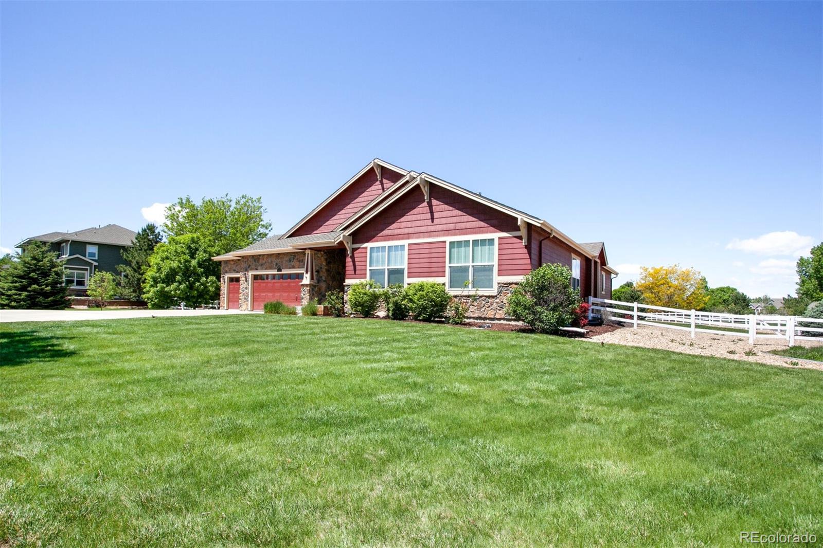 16283 Olive Way Brighton, CO 80602 - Photo 5 of 33 a front view of a house with a yard