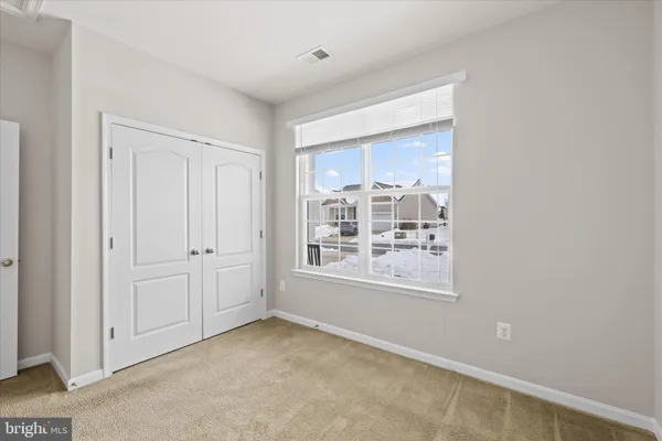 a view of an empty room with window
