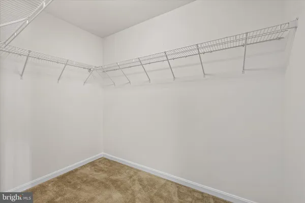 a view of a room with racks on the wall