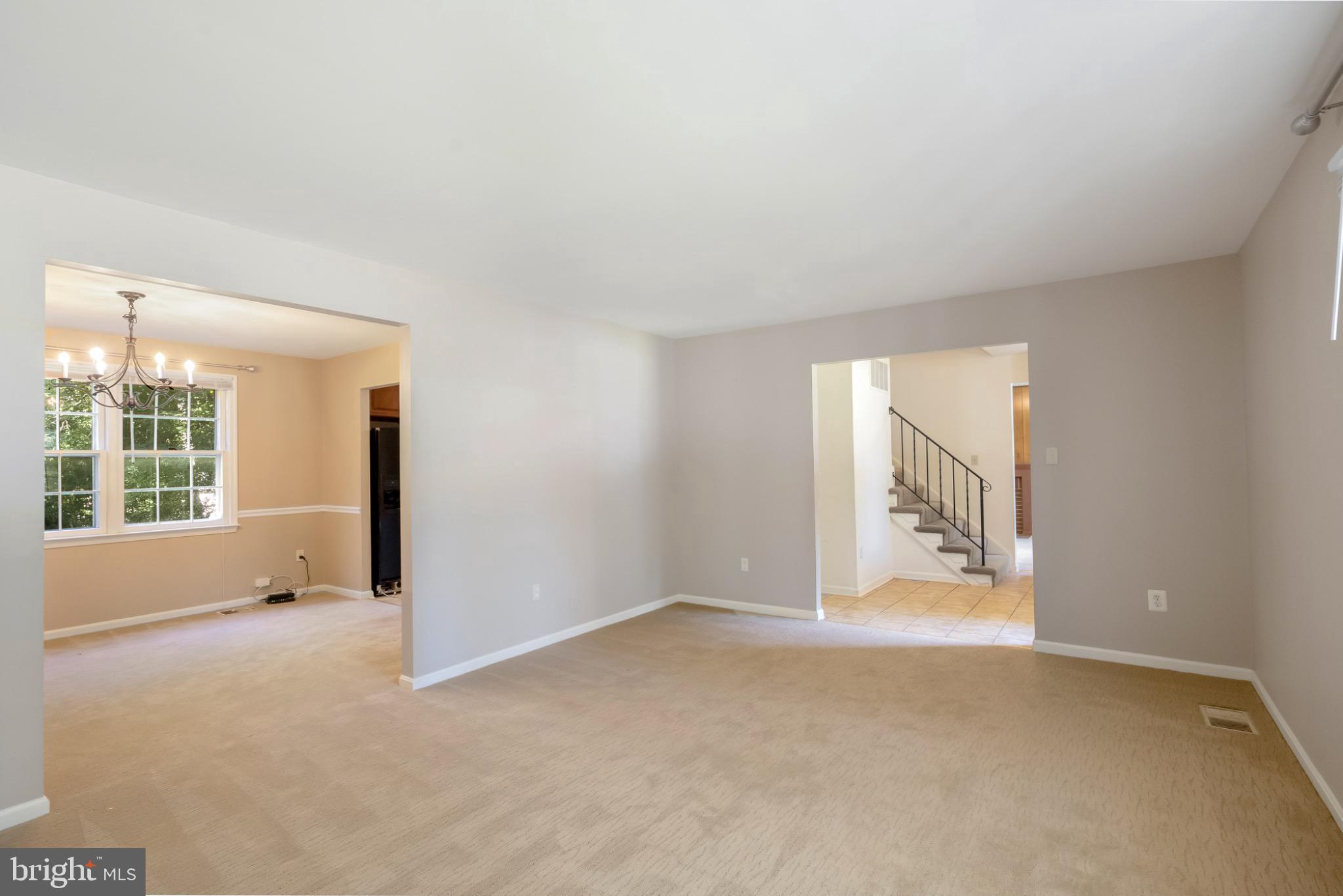 7223 Reservation Drive Springfield, VA 22153 - Photo 11 of 40 Spacious, light-filled living area awaits you.