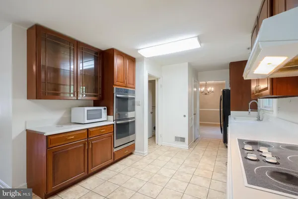 a view of an empty room with glass door