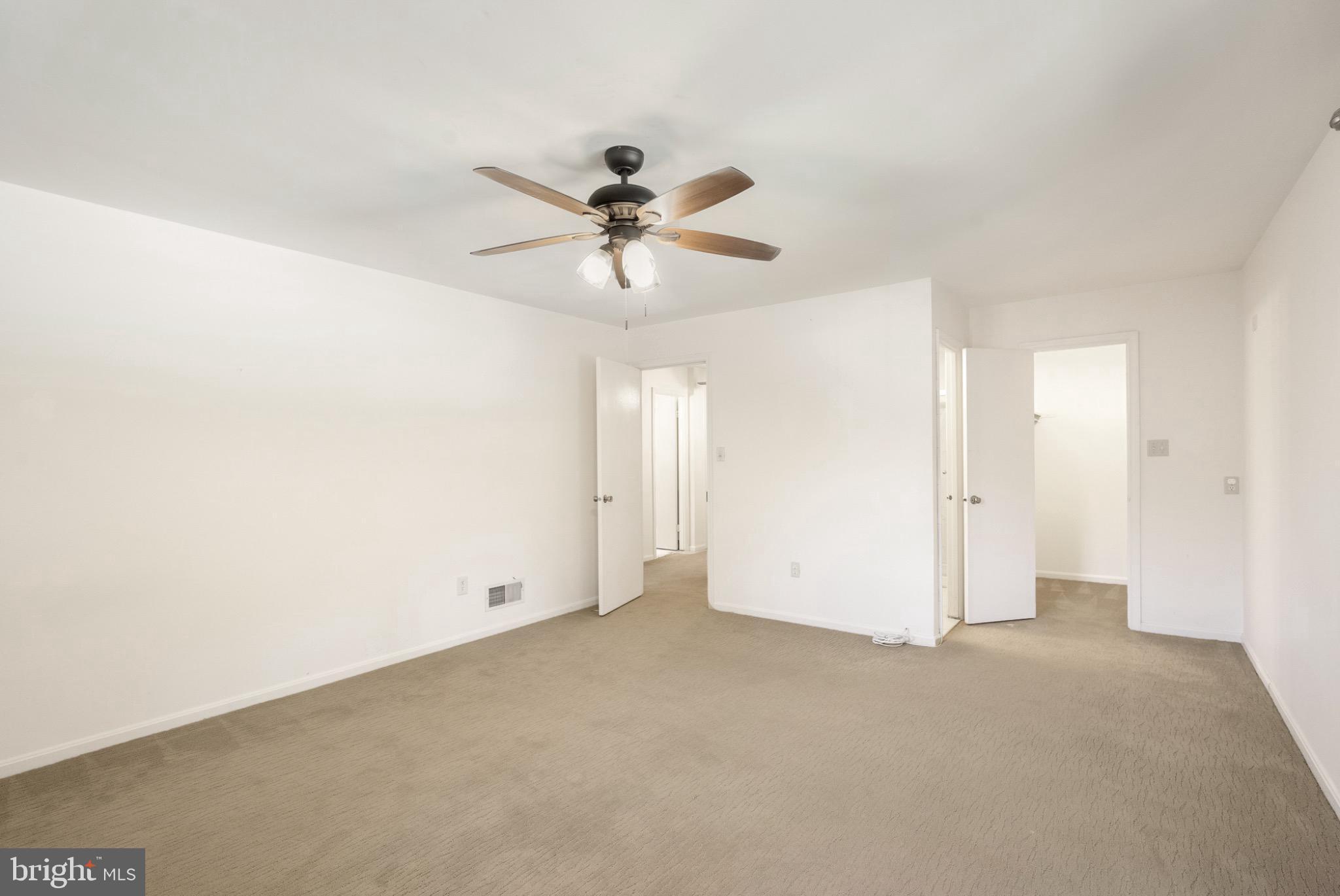 7223 Reservation Drive Springfield, VA 22153 - Photo 22 of 40 Spacious, light-filled room with ceiling fan.