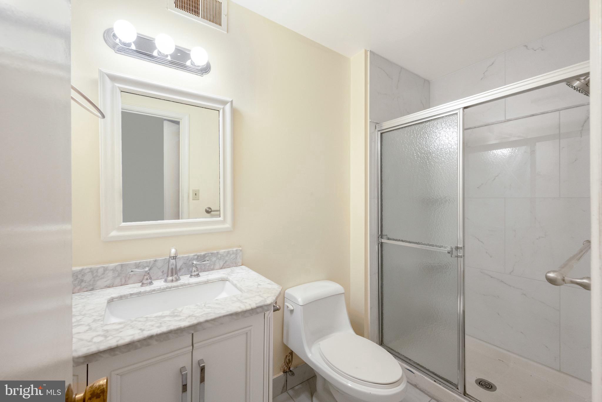 7223 Reservation Drive Springfield, VA 22153 - Photo 23 of 40 Modern bathroom with sleek finishes.