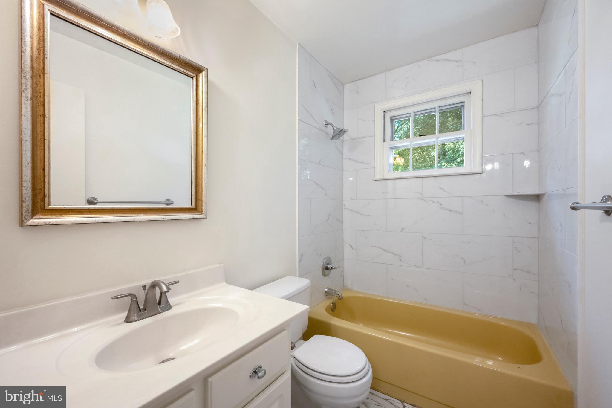 7223 Reservation Drive Springfield, VA 22153 - Photo 31 of 40 Bright and airy bathroom with modern finishes.