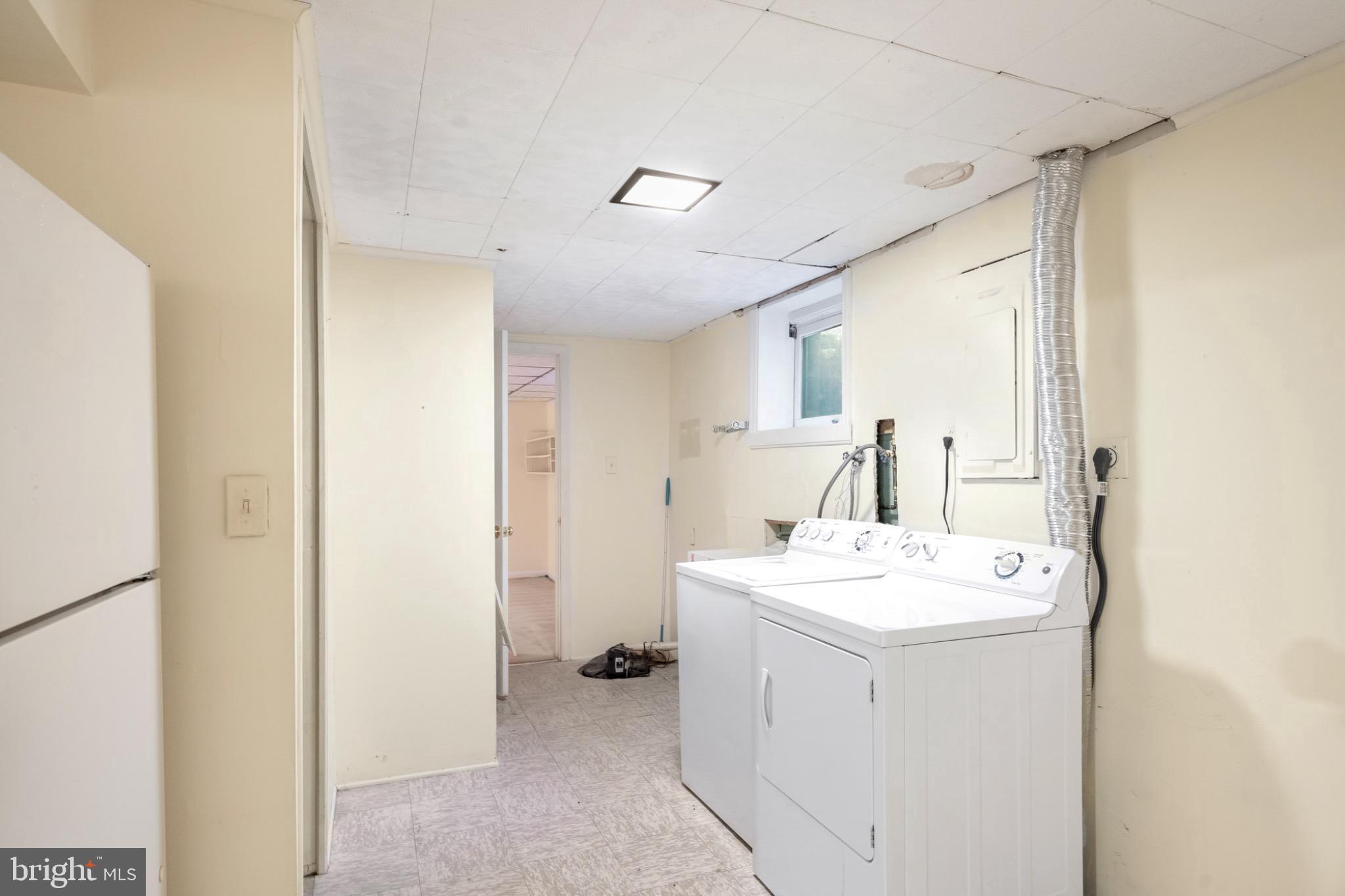 7223 Reservation Drive Springfield, VA 22153 - Photo 35 of 40 Bright and functional laundry space.