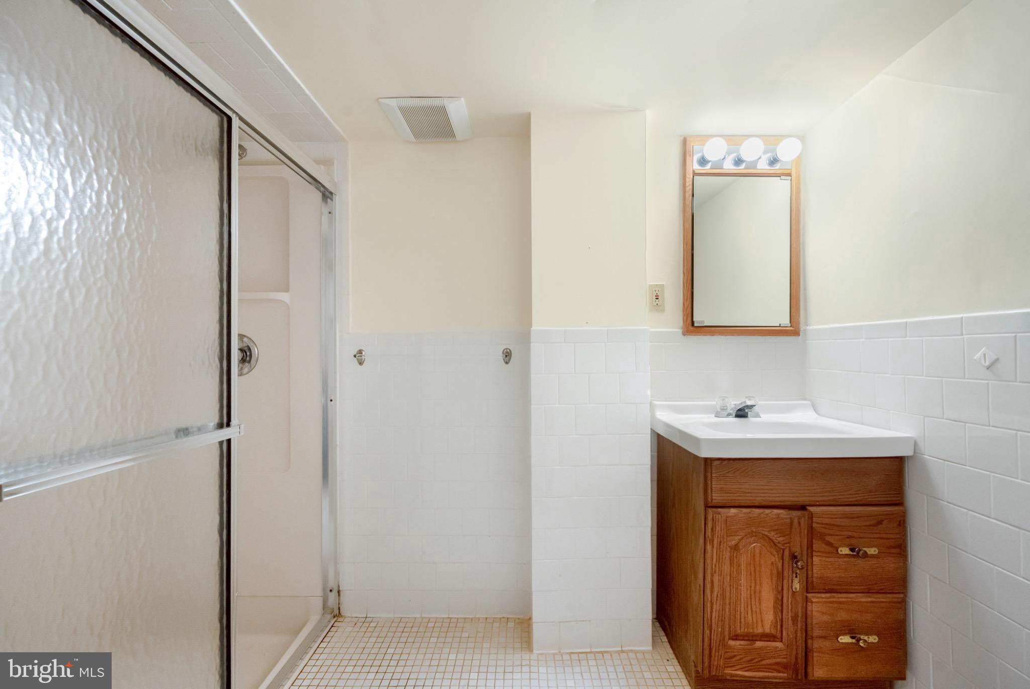 7223 Reservation Drive Springfield, VA 22153 - Photo 40 of 40 Bright and airy bathroom with modern touches.
