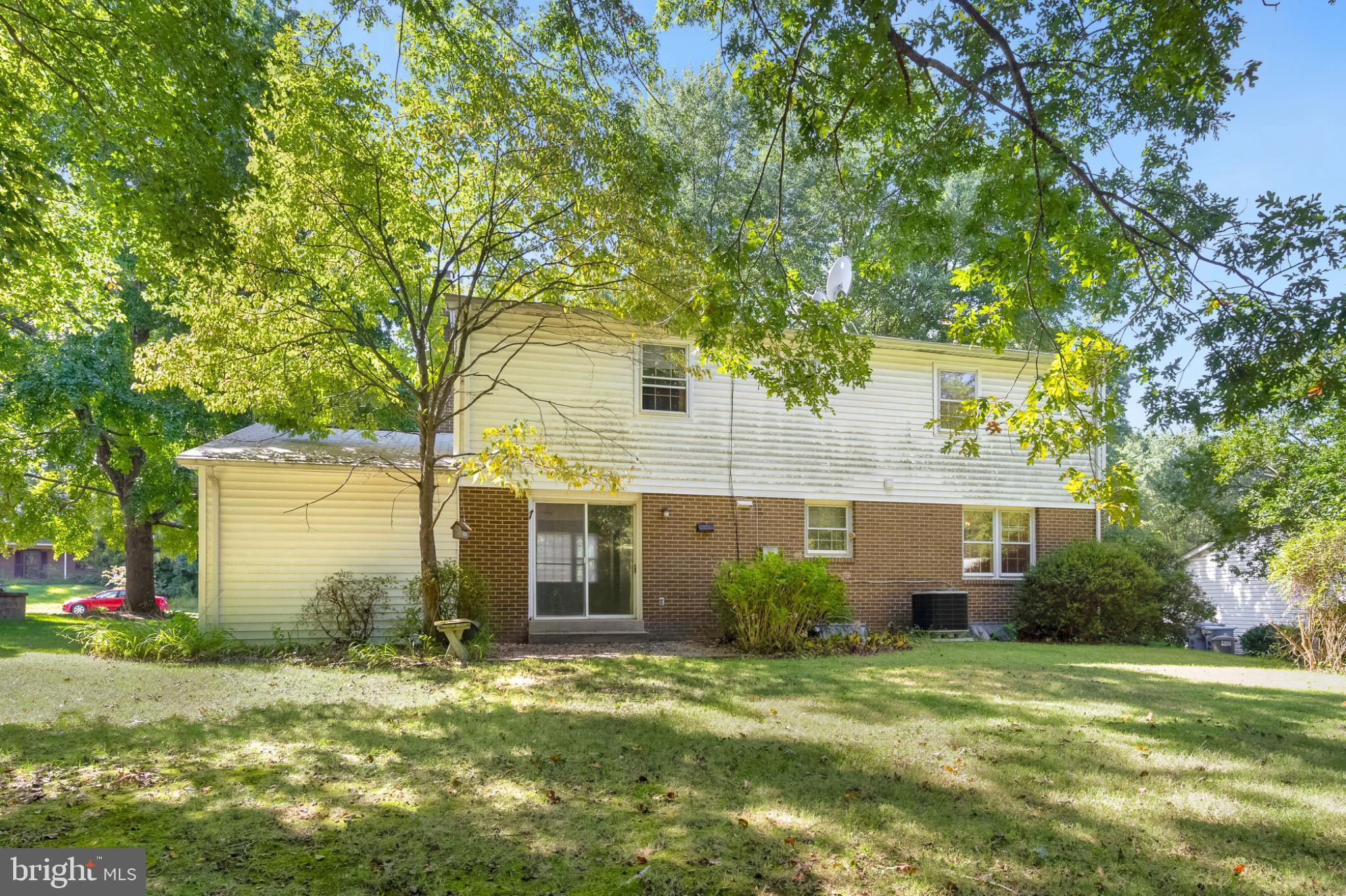 7223 Reservation Drive Springfield, VA 22153 - Photo 5 of 40 Charming home nestled in lush greenery.