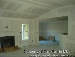 5636 Nessee Street Fayetteville, NC 28314 - Photo 2 of 4 a view of empty room with windows