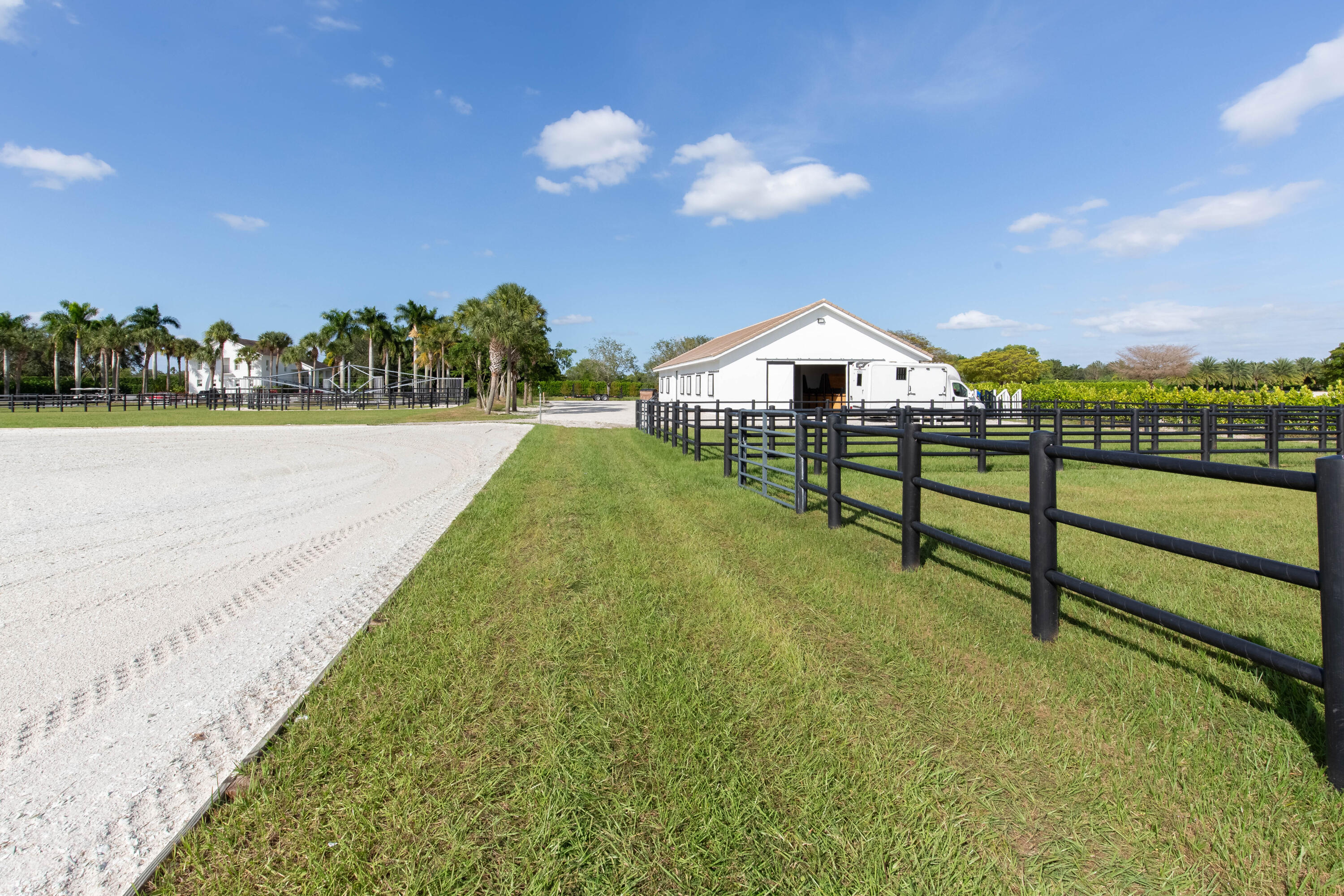 13250 Southfields Road Wellington, FL 33414 - Photo 61 of 72 Arena and Paddocks