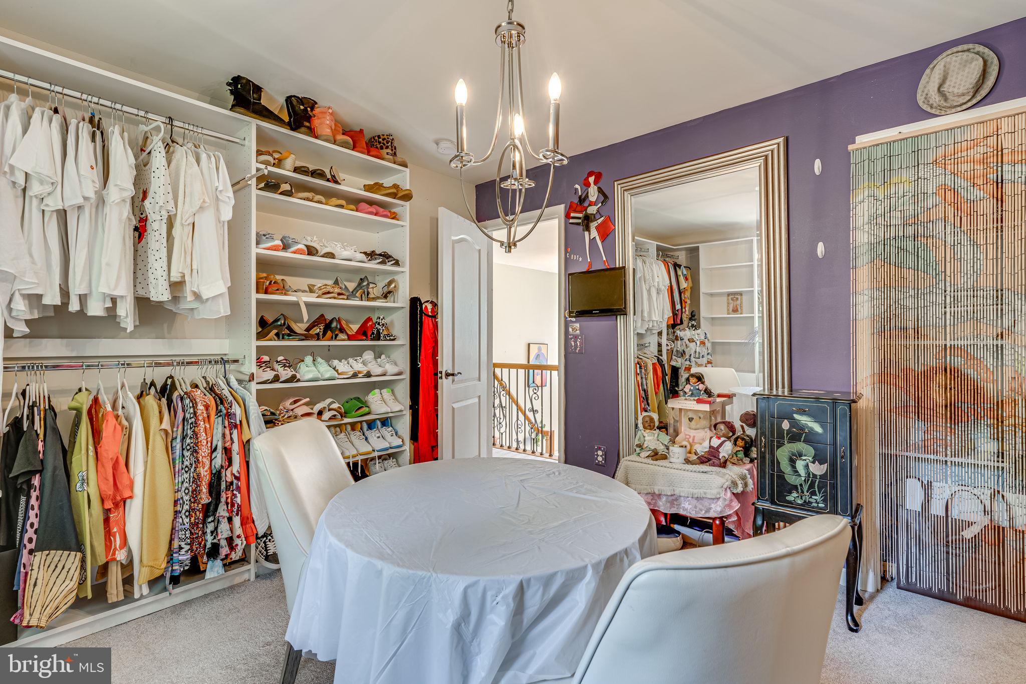 6904 North Stuart Road King George, VA 22485 - Photo 22 of 47 a outdoor dining room with furniture and a chandelier