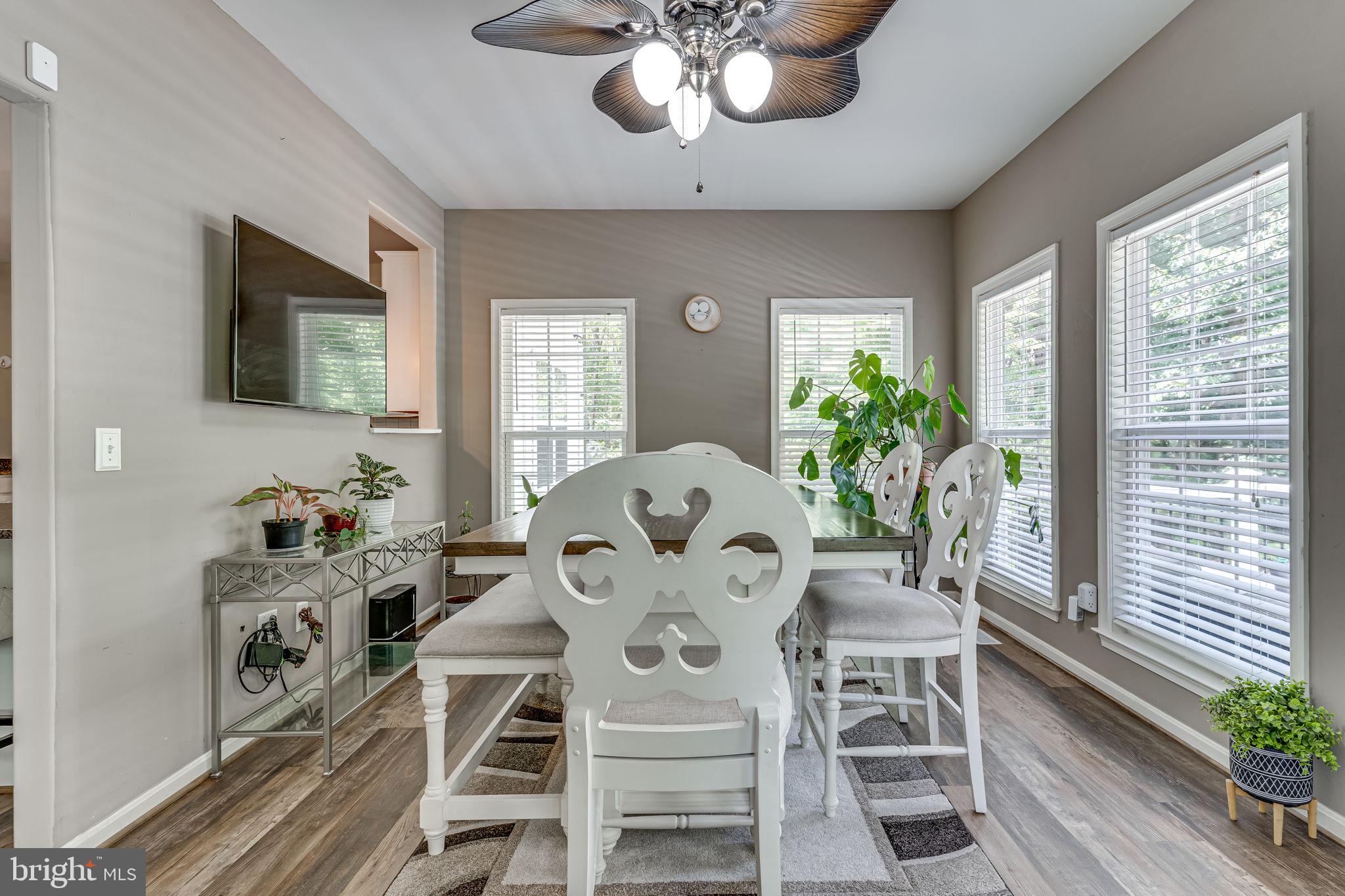 6904 North Stuart Road King George, VA 22485 - Photo 3 of 47 a view of a dining room with furniture window and outside view