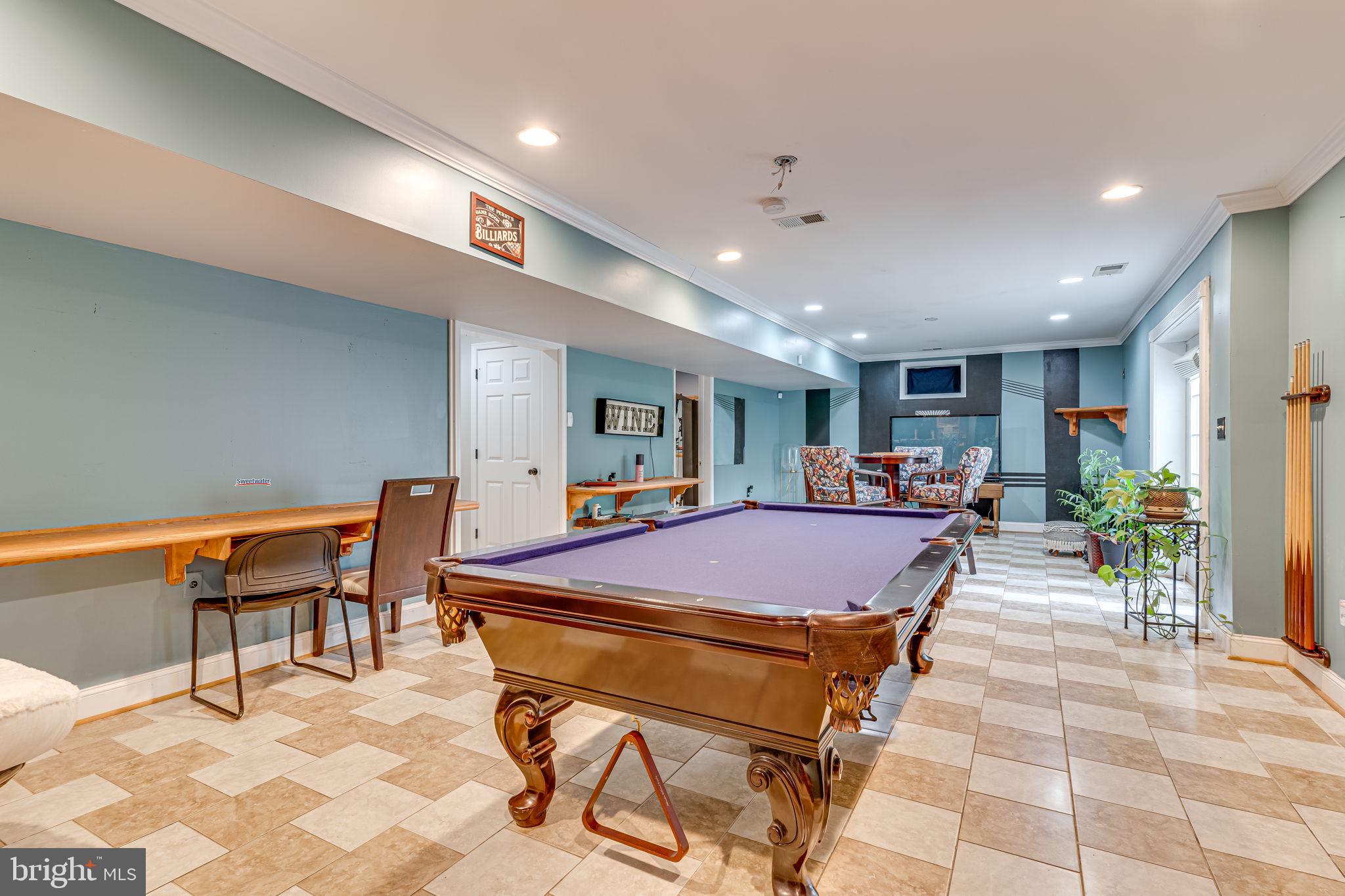 6904 North Stuart Road King George, VA 22485 - Photo 33 of 47 a room with table tennis table and chairs