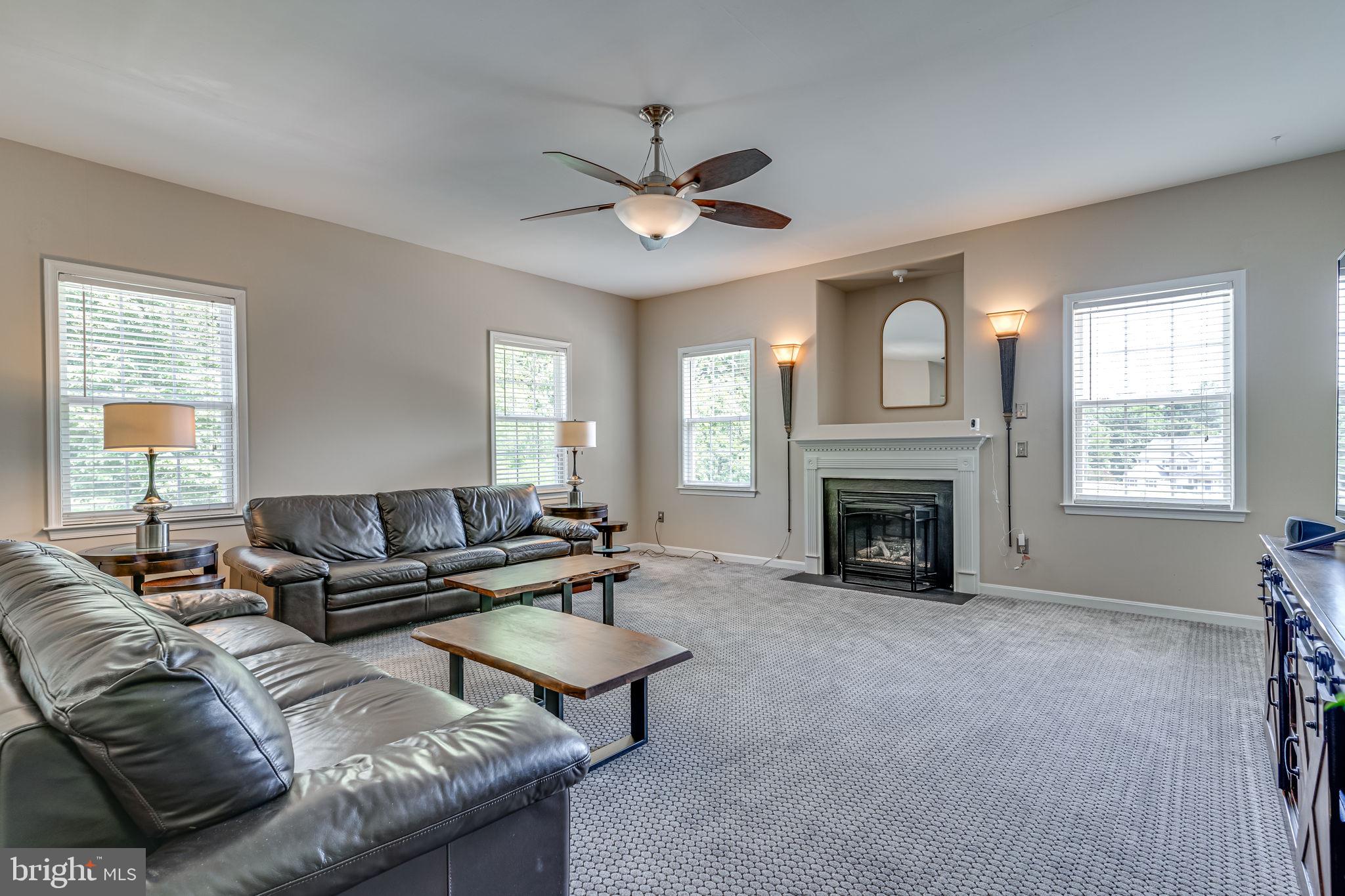 6904 North Stuart Road King George, VA 22485 - Photo 4 of 47 a living room with furniture and a fireplace