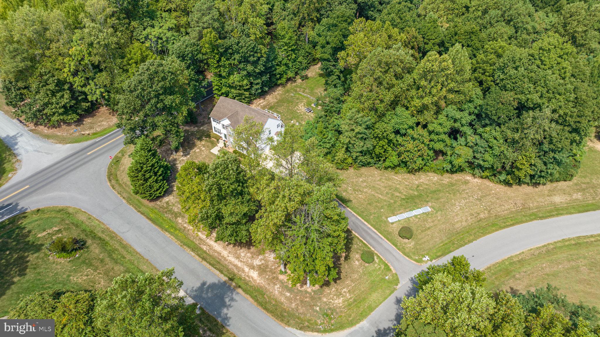 6904 North Stuart Road King George, VA 22485 - Photo 42 of 47 a view of a small yard with plants