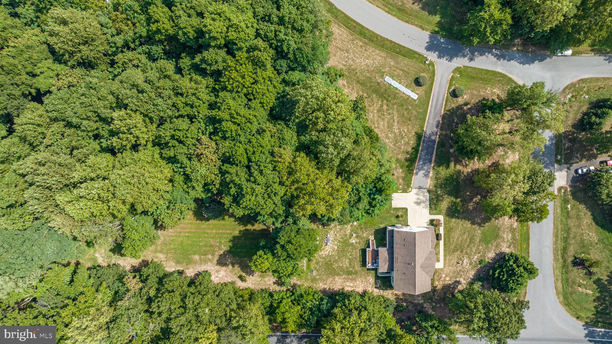 6904 North Stuart Road King George, VA 22485 - Photo 45 of 47 an aerial view of a house with a yard