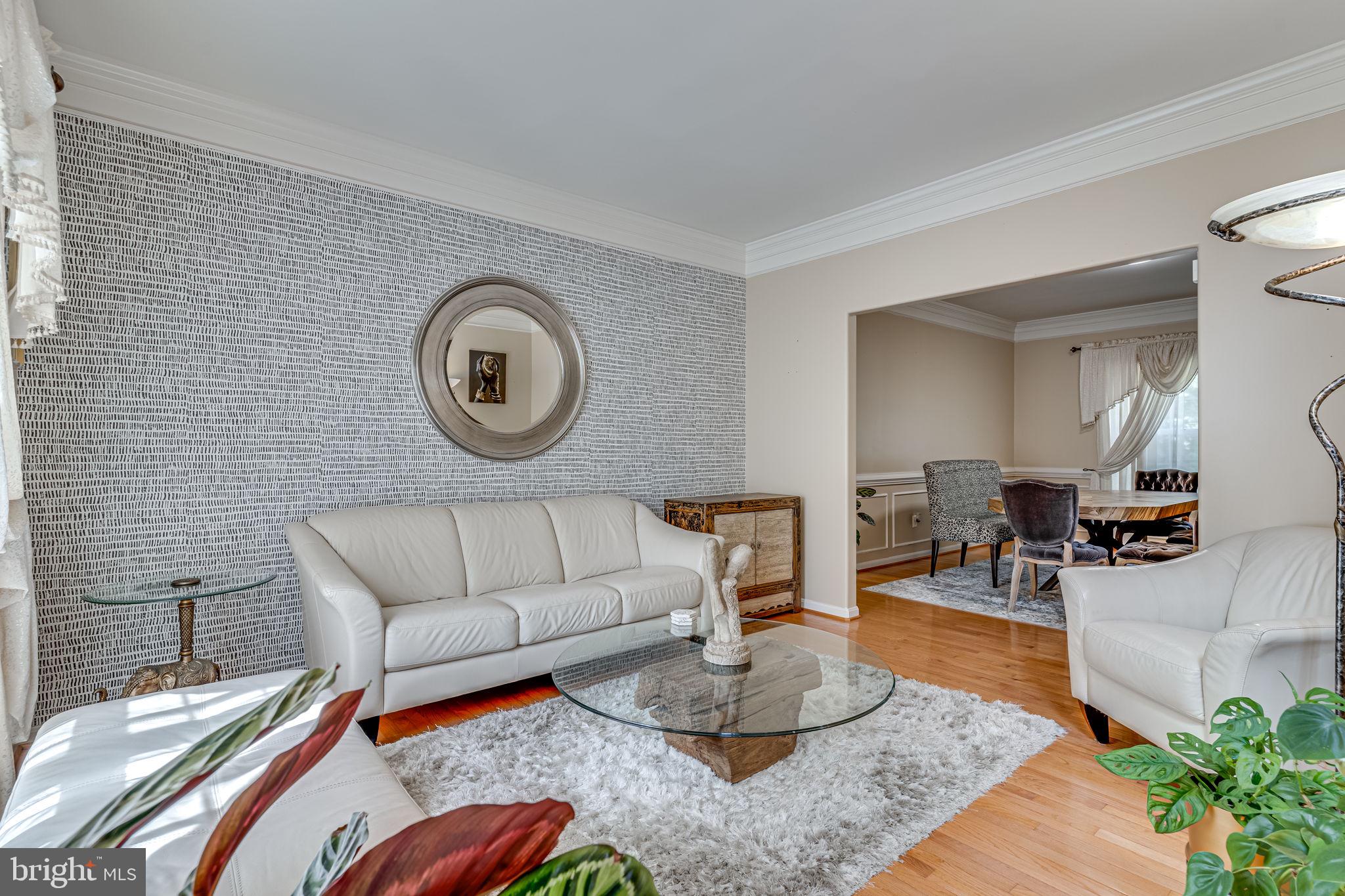 6904 North Stuart Road King George, VA 22485 - Photo 7 of 47 a living room with furniture and wooden floor