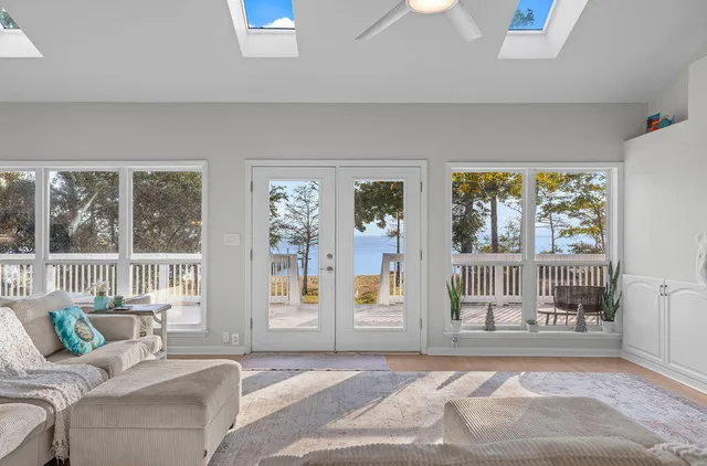 a pathway of a house with a yard