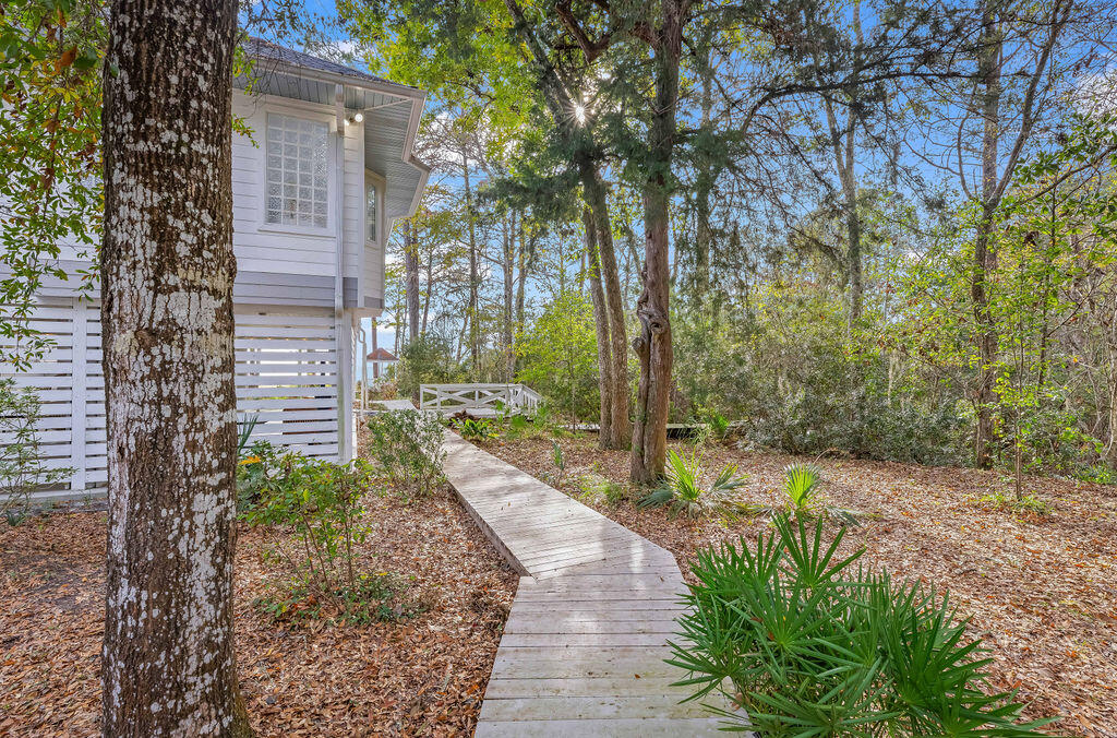 7819 Highway 20 Freeport, FL 32439 - Photo 34 of 75 a pathway of a house with a yard