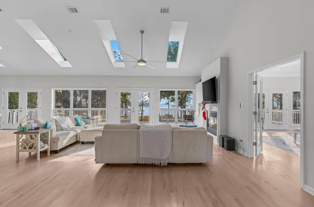 a bathroom with double sink and a mirror