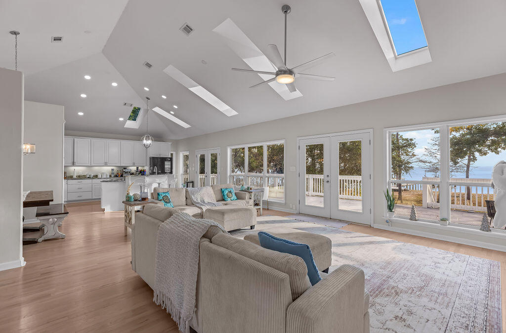 7819 Highway 20 Freeport, FL 32439 - Photo 9 of 75 a living room with furniture and a large window