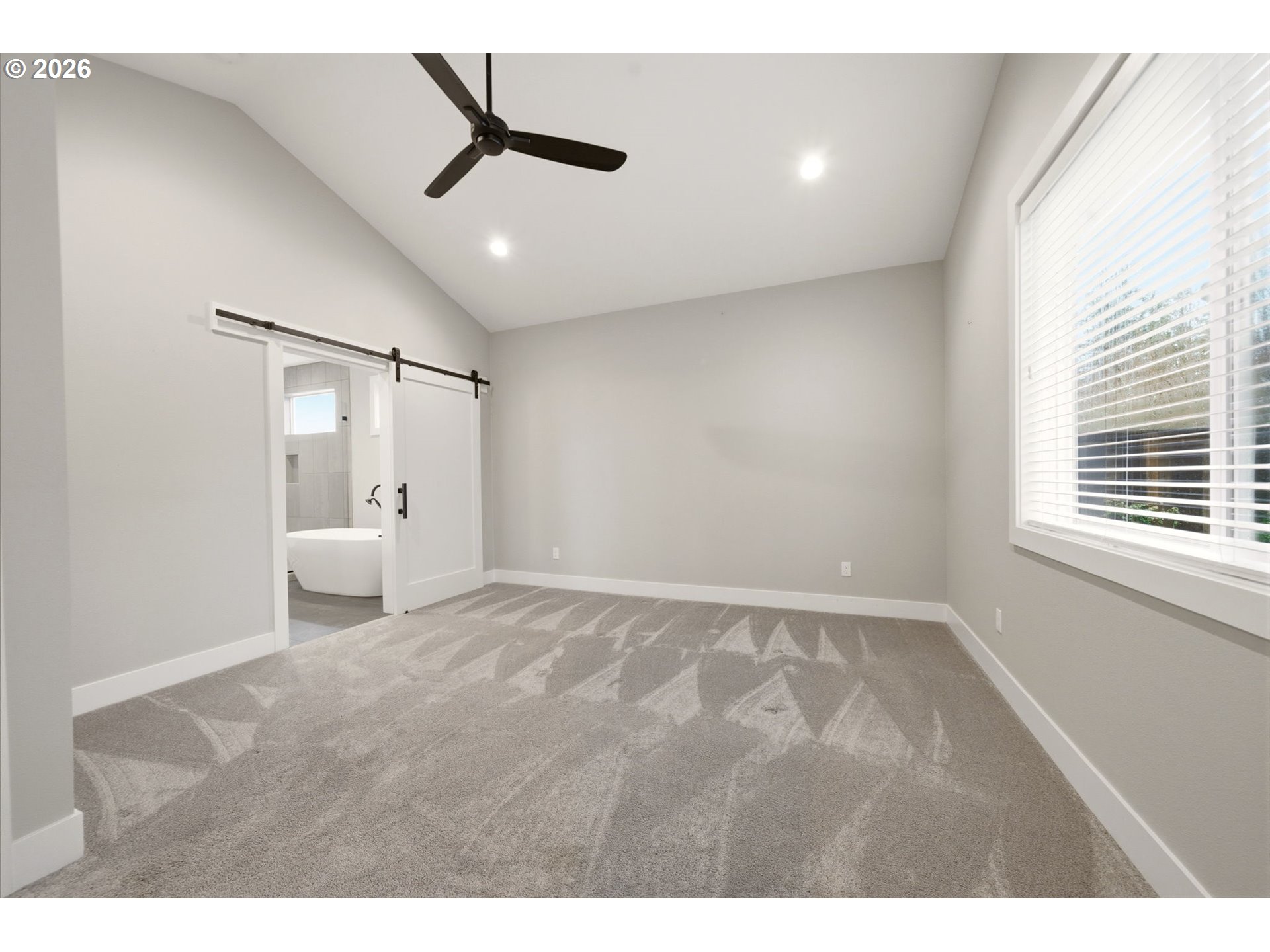37354 American Street Sandy, OR 97055 - Photo 20 of 37 a view of a livingroom with a ceiling fan and window