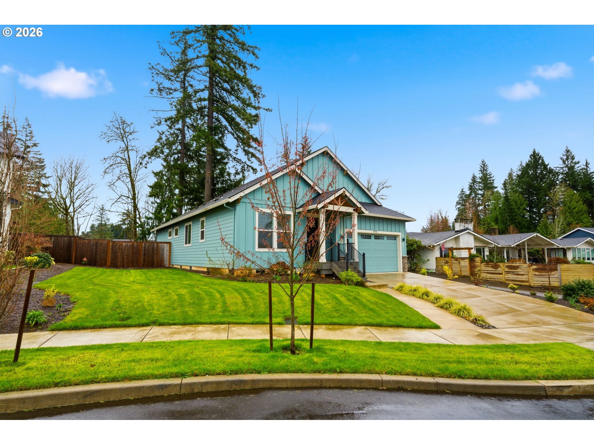 37354 American Street Sandy, OR 97055 - Photo 4 of 37 a view of an house with a yard and table and chairs