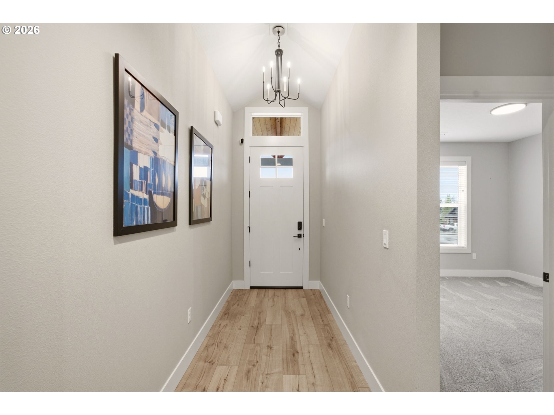 37354 American Street Sandy, OR 97055 - Photo 6 of 37 a view of a hallway view with wooden floor and staircase
