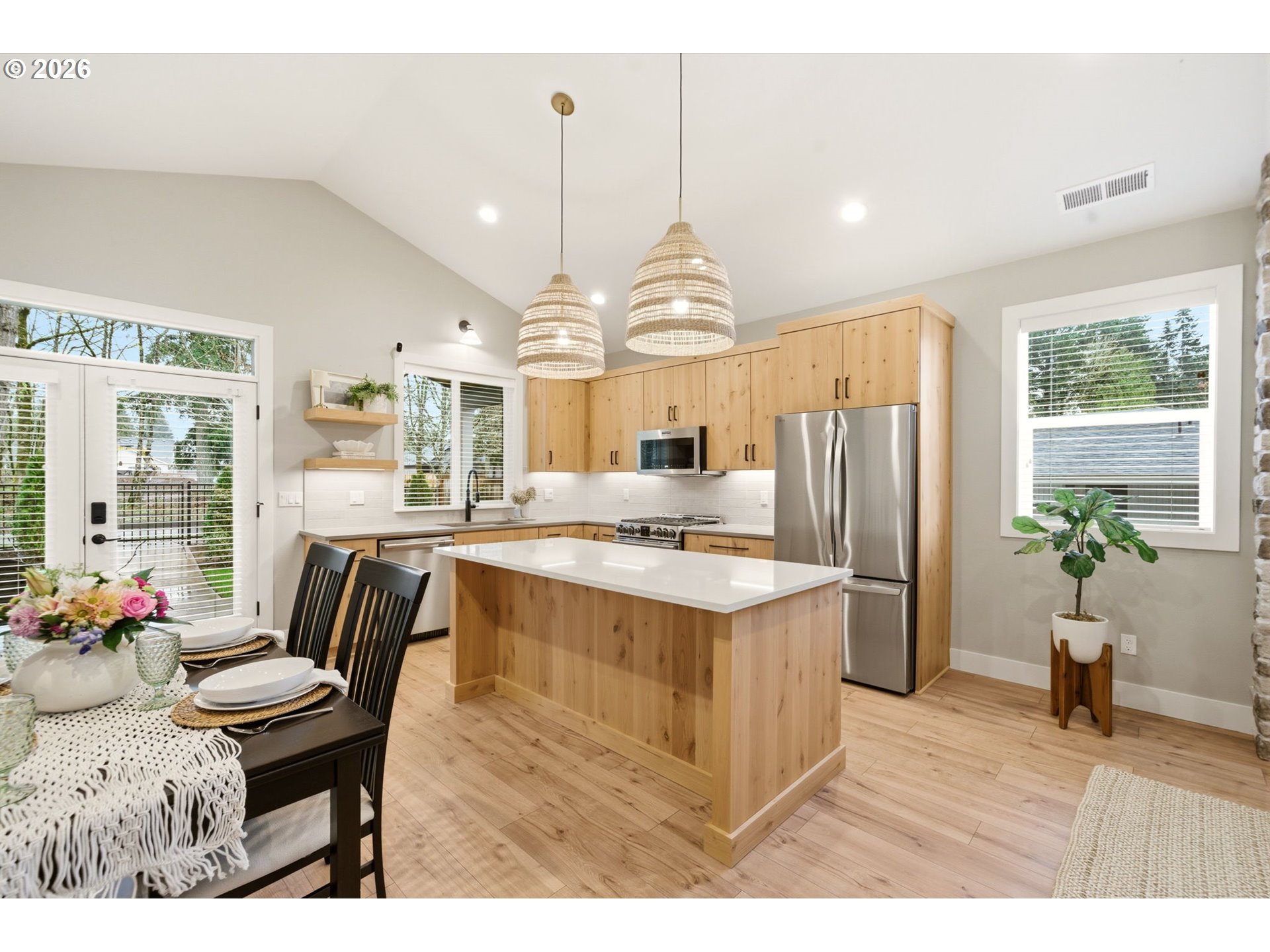 37354 American Street Sandy, OR 97055 - Photo 9 of 37 a open kitchen with stainless steel appliances granite countertop a stove and refrigerator
