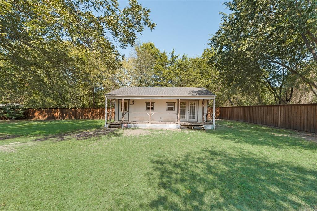233 East High Street Wills Point, TX 75169 - Photo 21 of 35 Back of house with a fenced backyard and a porch