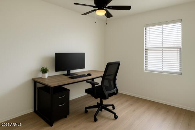 2319 West Alta Vista Road Phoenix, AZ 85041 - Photo 6 of 43 a view of a workspace with furniture and a window