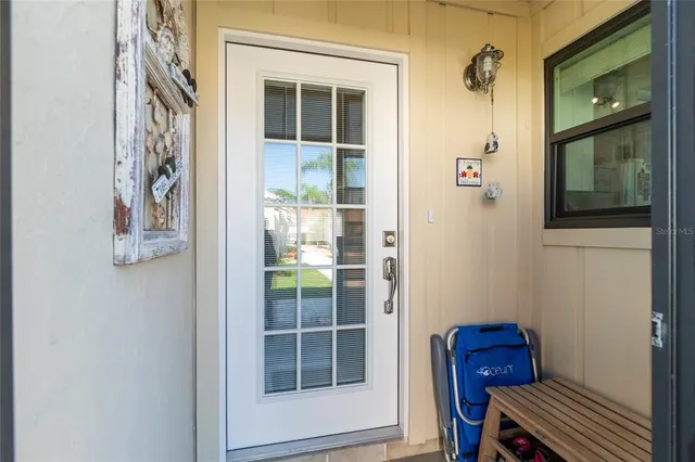 a view of a hallway with front door