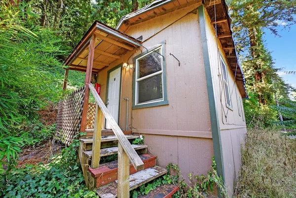 a picture of a bench in front of a door