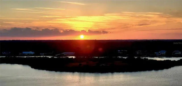 a view of city and sunset