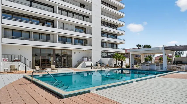 a view of a building with sitting area