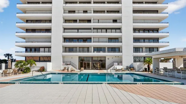 a view of a building with a street