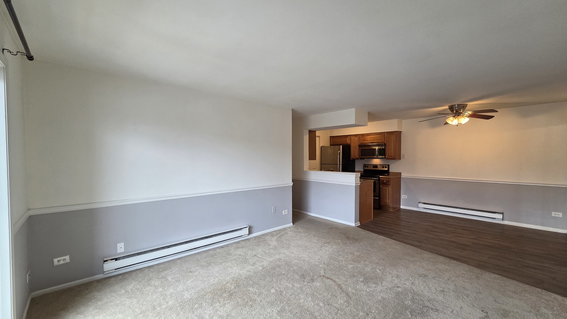 627 South Virginia Road, Unit 212 Crystal Lake, IL 60014 - Photo 7 of 15 a open kitchen with refrigerator and stove