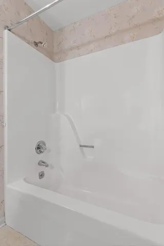 a bathroom with a bathtub