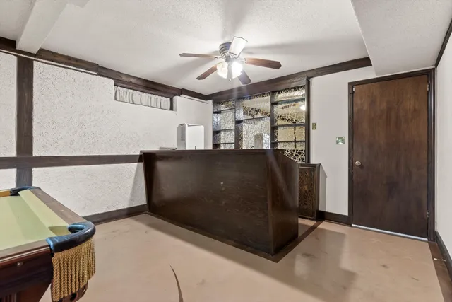 a view of a hallway with workspace