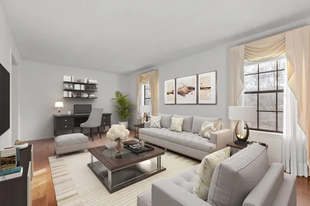 a living room with furniture or couch and a flat screen tv