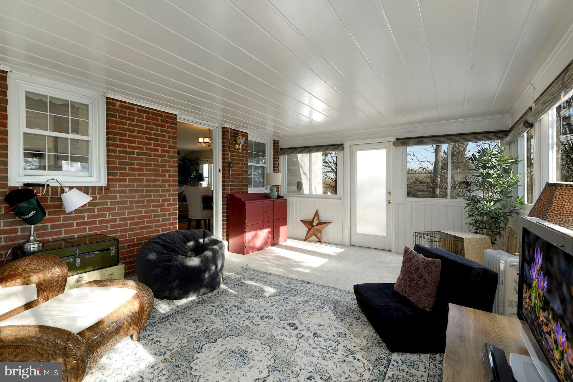 9808 Hawkins Creamery Road Damascus, MD 20872 - Photo 22 of 34 Light filled sunroom
