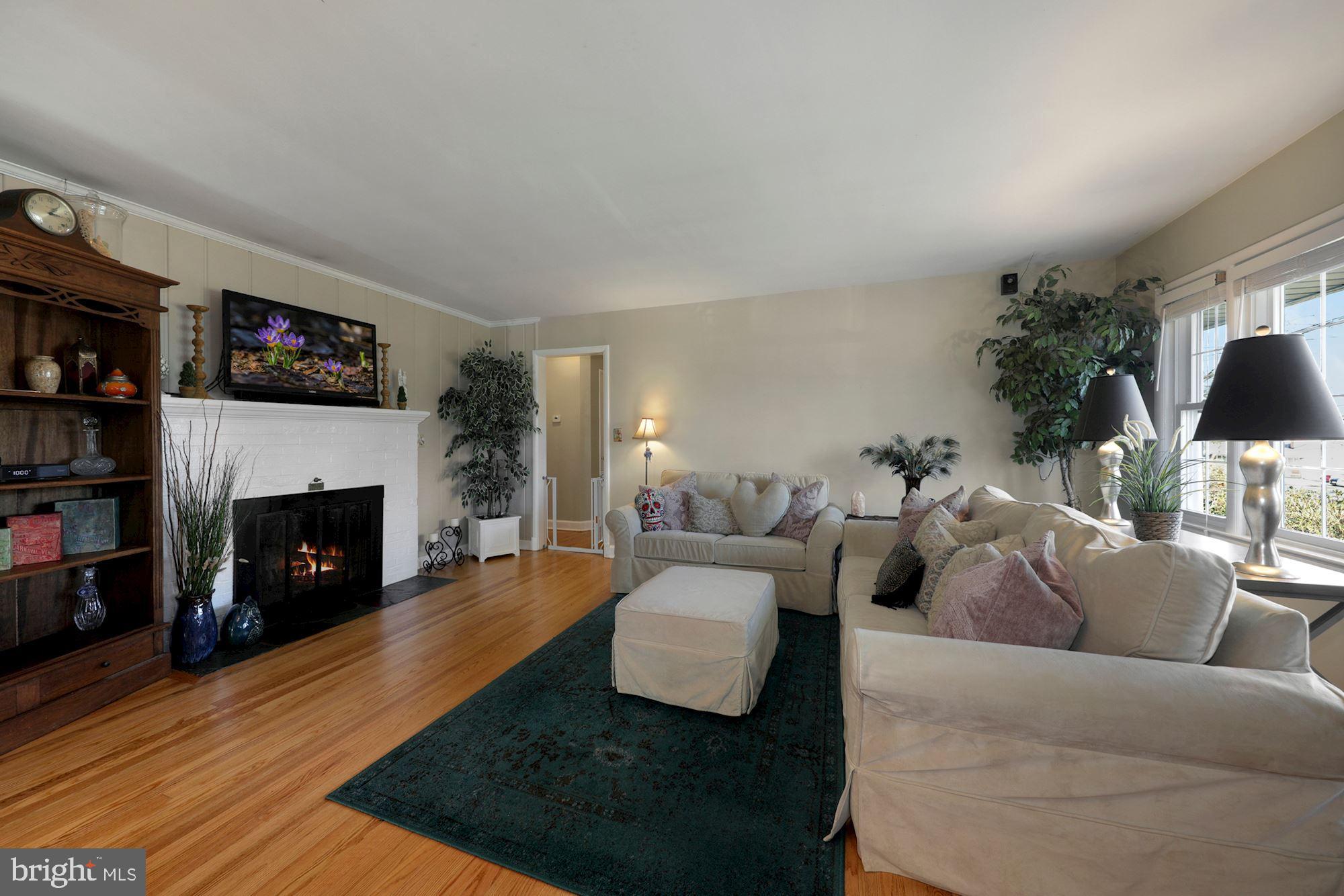9808 Hawkins Creamery Road Damascus, MD 20872 - Photo 9 of 34 Family room with fireplace