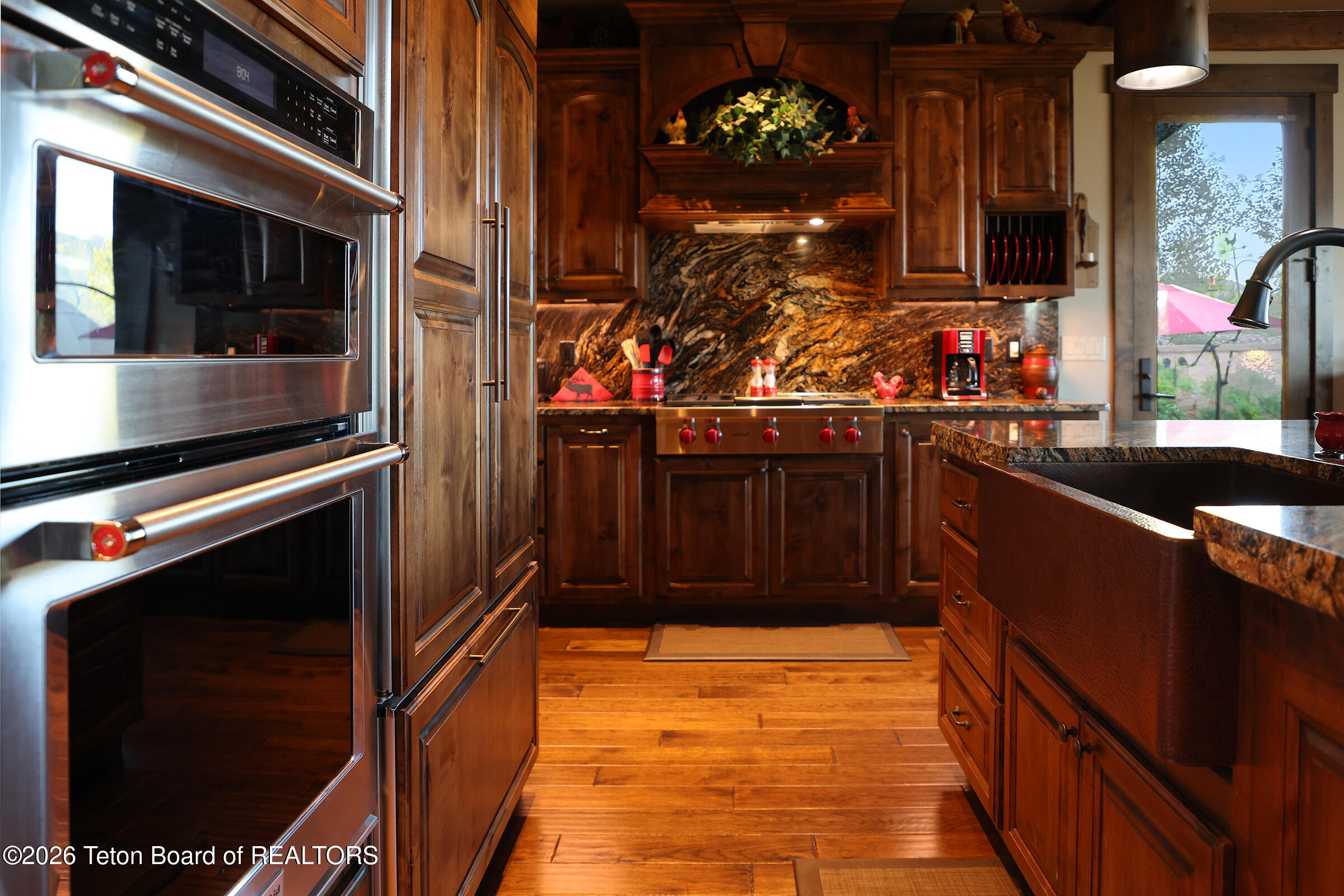 166 Aspen Ridge Trail Alpine, WY 83128 - Photo 11 of 50 9_166_Aspen_Ridge_Trail_KitchenRangeStov