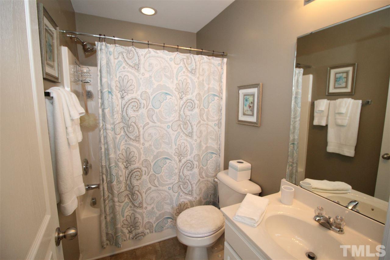 7757 Winners Edge Street Raleigh, NC 27617 - Photo 12 of 24 The Full Bath is privately tucked away in the Spa room! So each person has their own personal bath!
