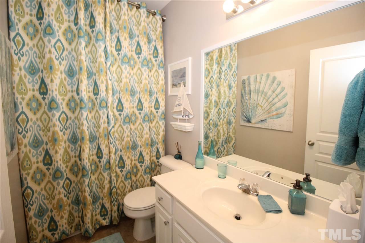 7757 Winners Edge Street Raleigh, NC 27617 - Photo 18 of 24 Here is the full bath on the lower level!