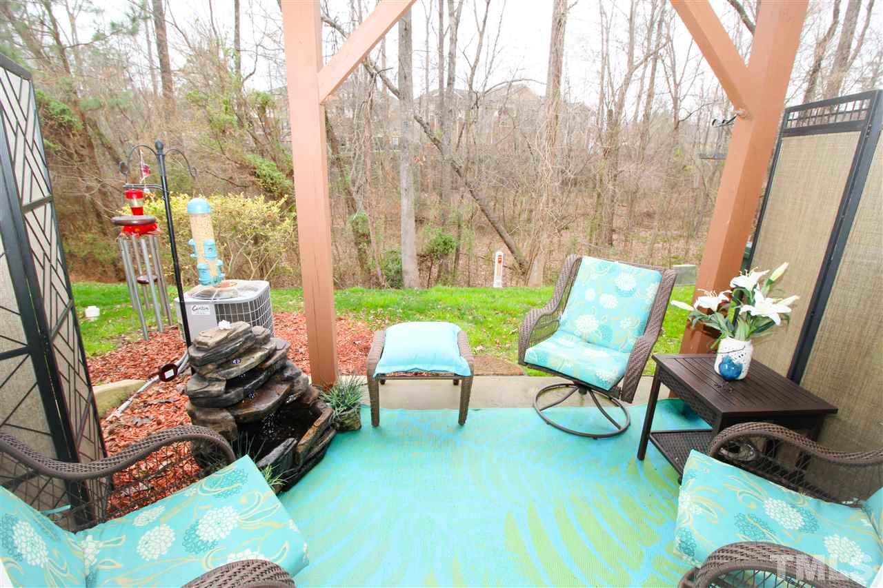 7757 Winners Edge Street Raleigh, NC 27617 - Photo 23 of 24 The Patio is also set up with a water fountain, so peaceful and beautiful views! This is the lower level!