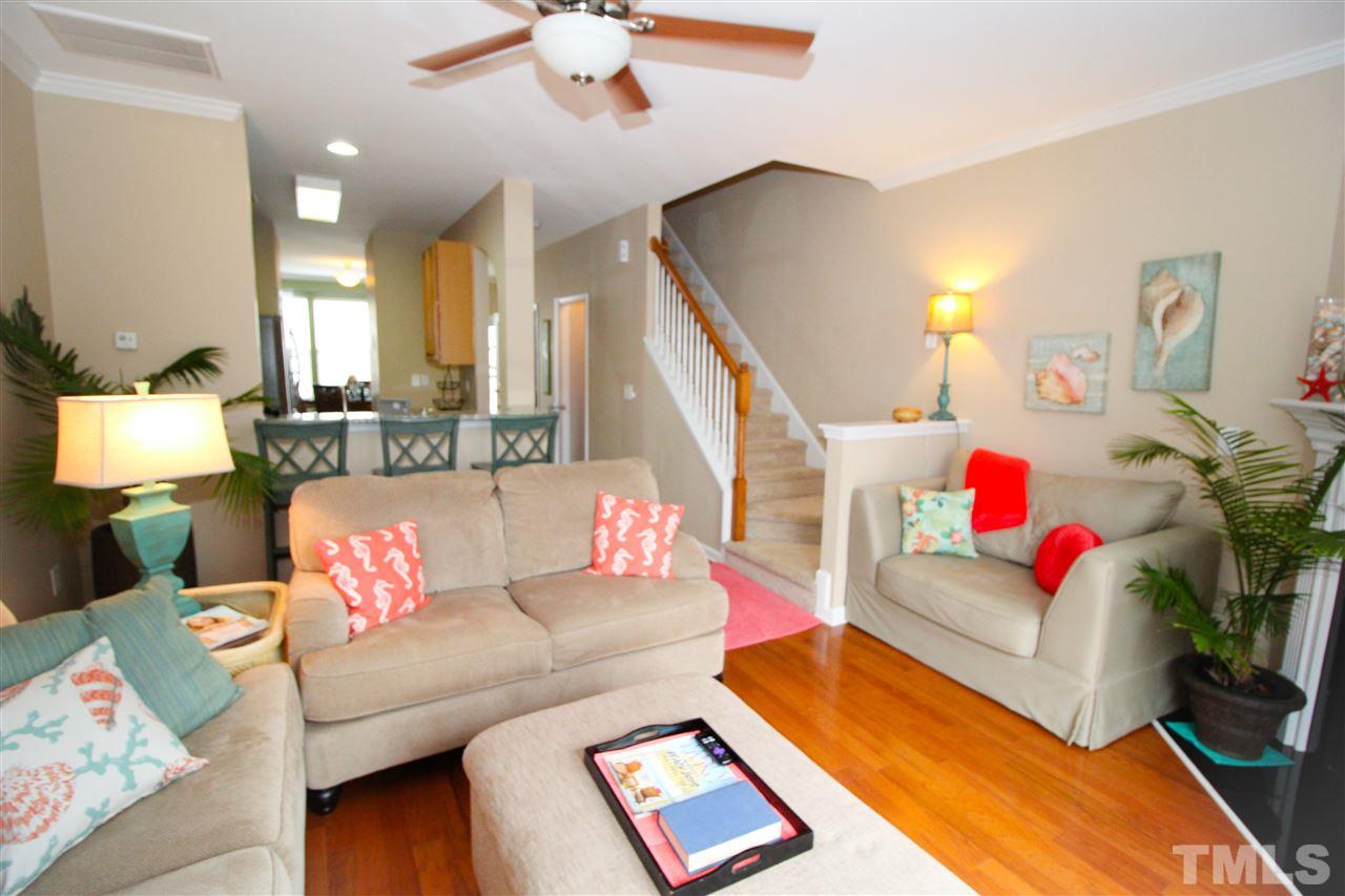 7757 Winners Edge Street Raleigh, NC 27617 - Photo 24 of 24 Another view of the Living Room looking through to the Kitchen! Love this floor plan, it is open and perfect for entertaining!