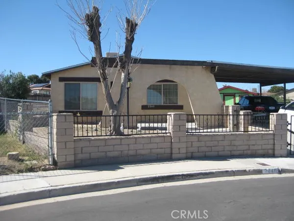 a front view of a house with garage and garage